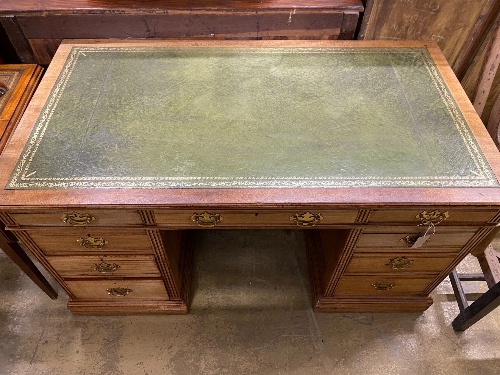 A late Victorian mahogany kneehole desk, length 137cm, depth 74cm, height 73cm